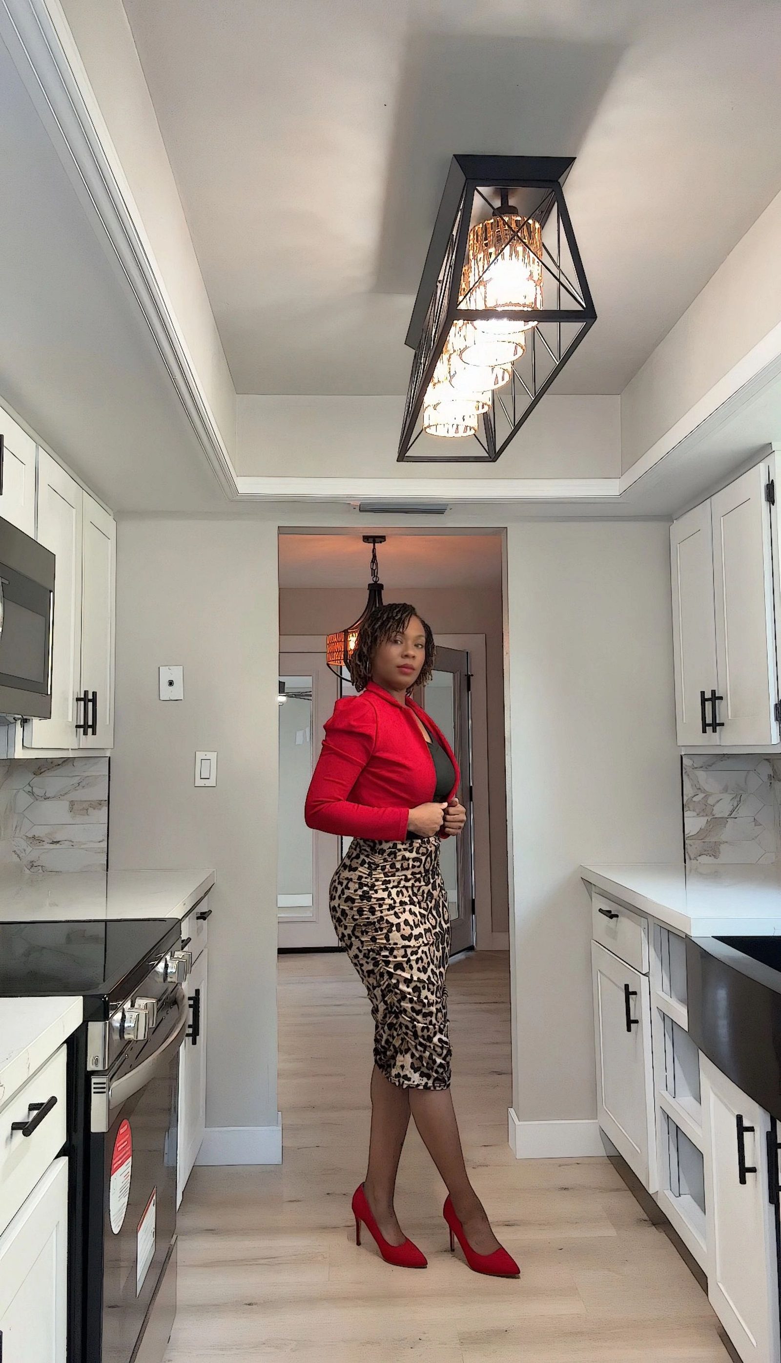 Ashlee Croft standing in a renovated Phoenix kitchen